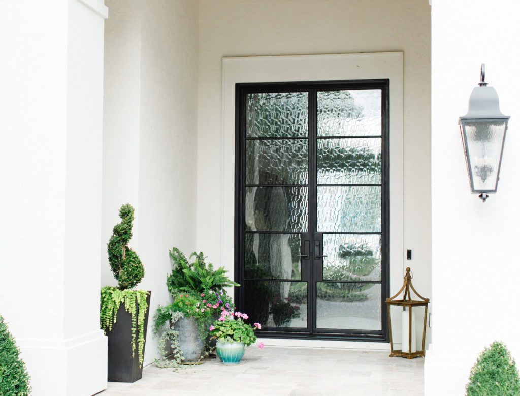 Modern door entryway with Flemish glass.