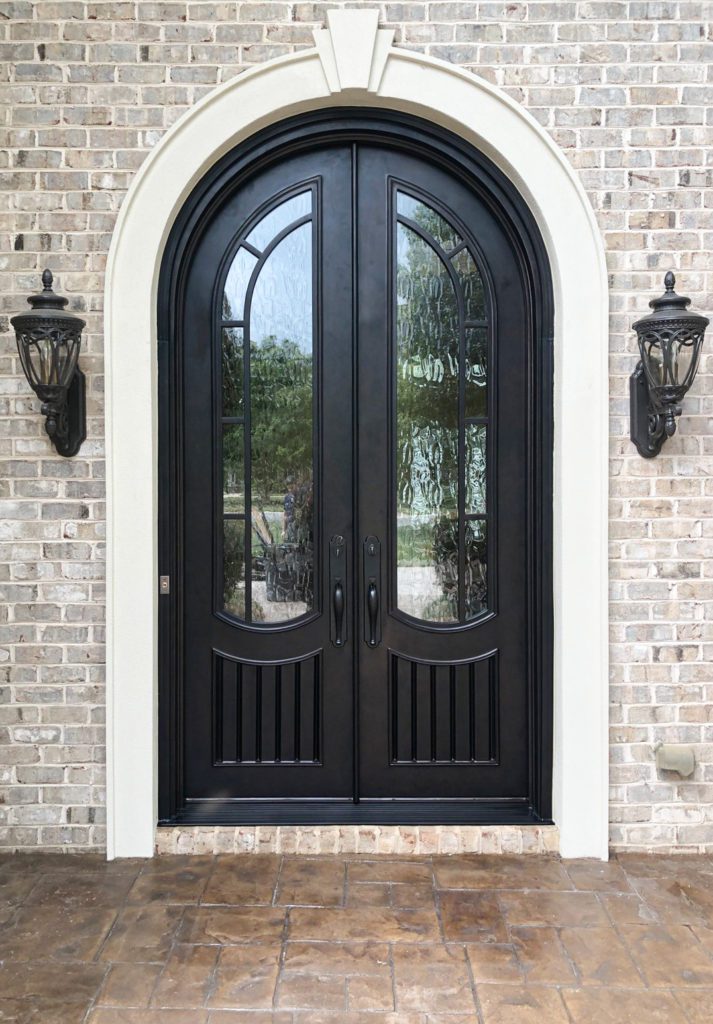 Traditional iron doors with round arch