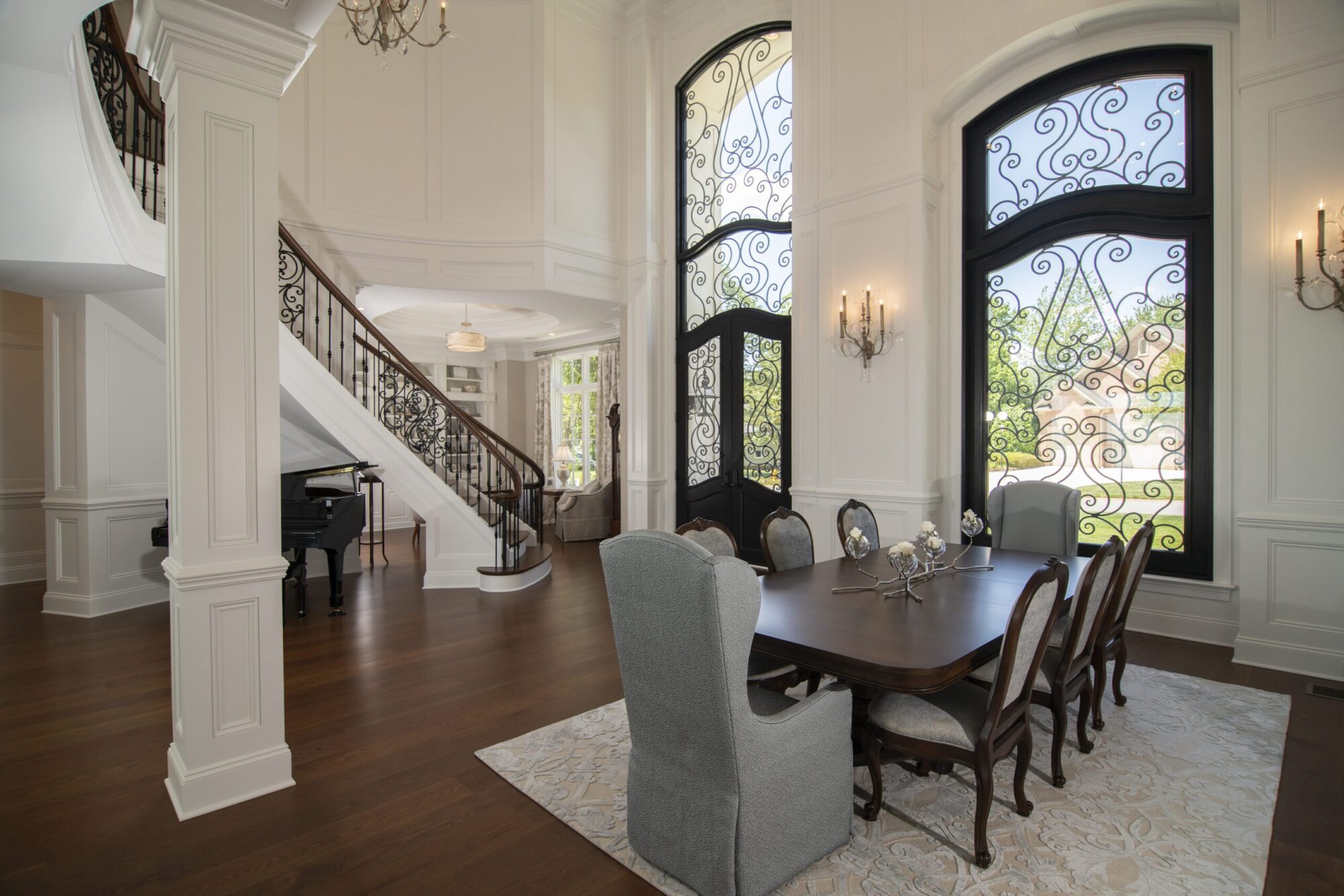 Foyer of award winning custom iron ornate window