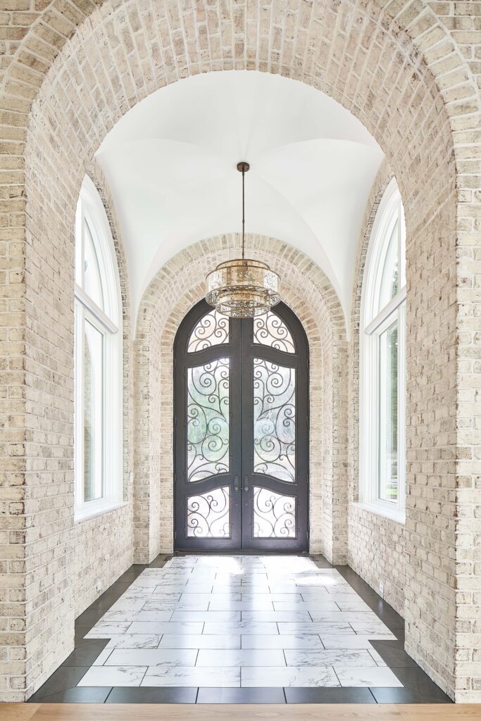 Arched ornate hallway foyer