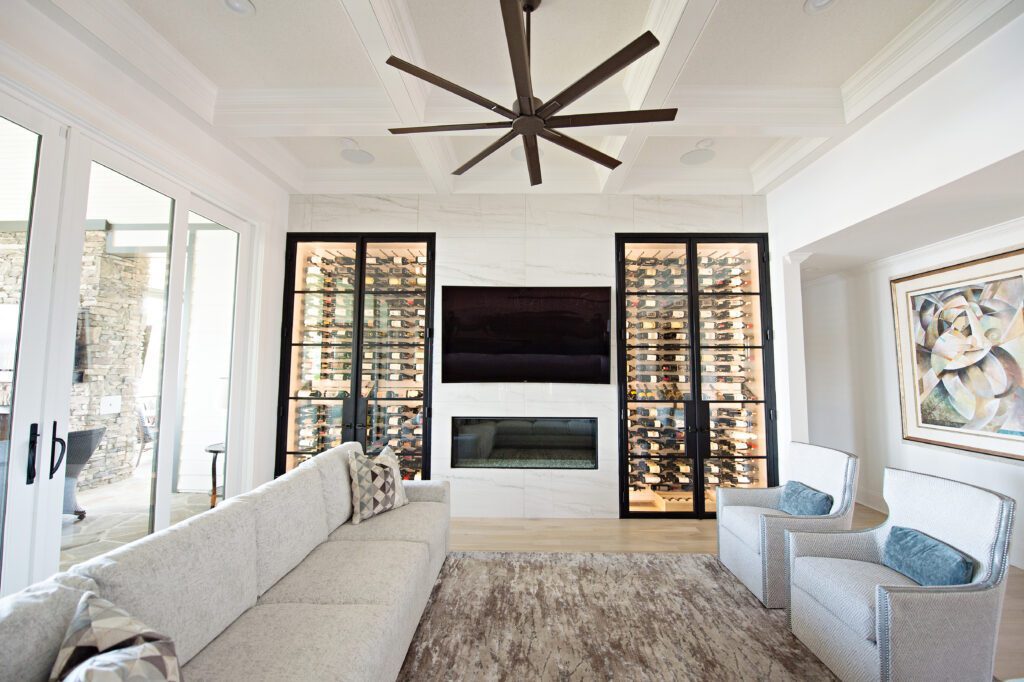 Iron wine cellar with glass doors in living room