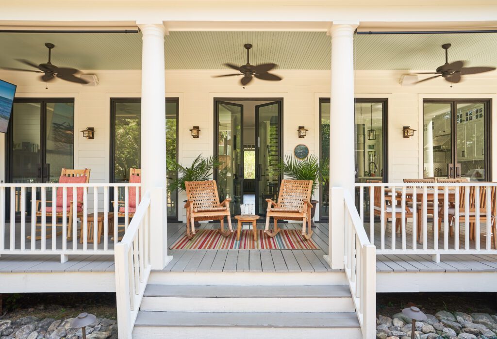 Patio with rocking chairs and glass doors