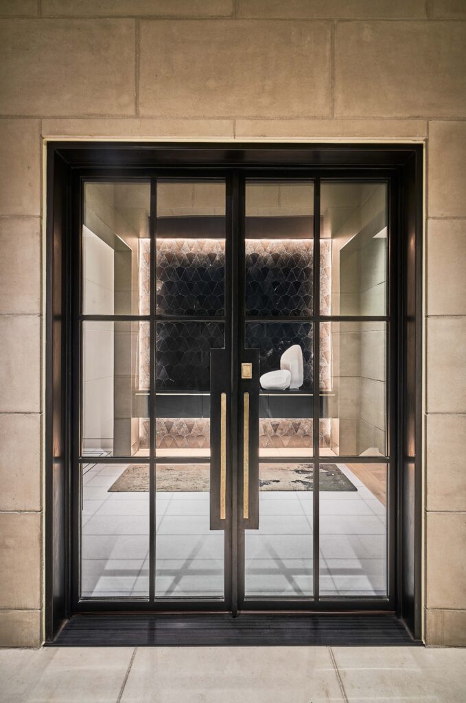 A modern double door with large glass windows.
