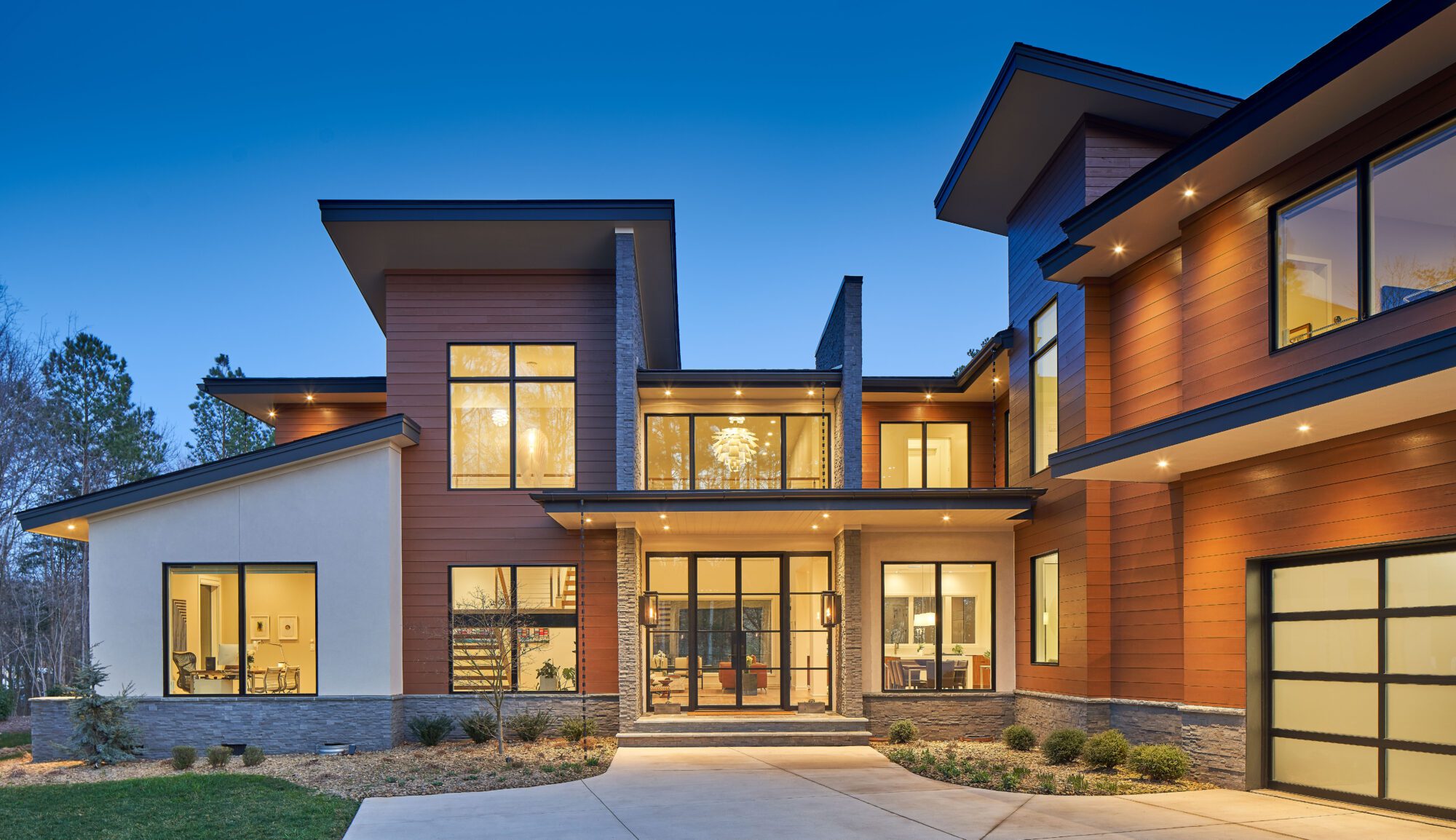 Modern home featuring steel doors.
