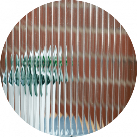 Reeded vertical high quality glass that insulated and tempered.