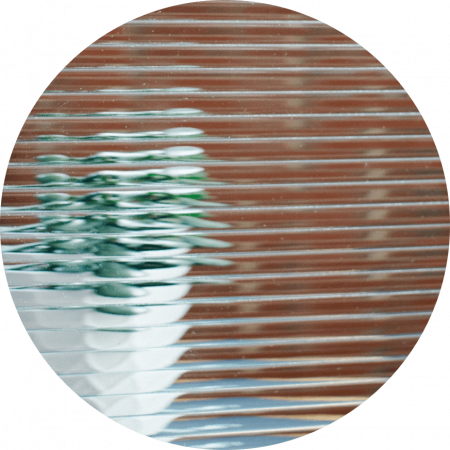 Horizontal reeded high quality glass that insulated and tempered.